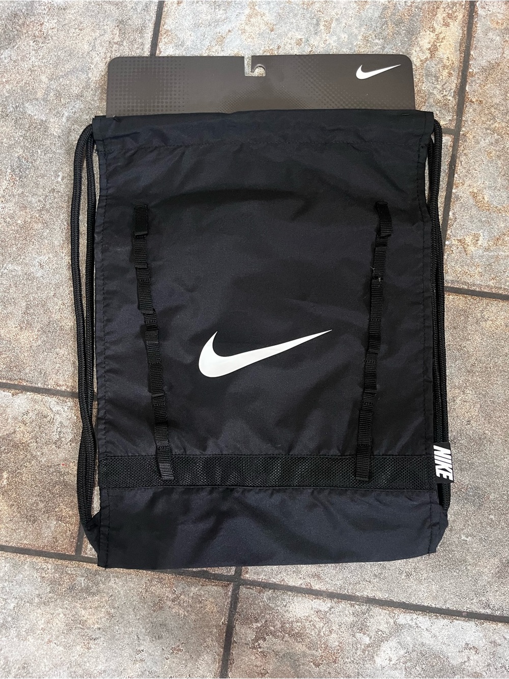 Nike Black Drawstring Backpack with White Swoosh